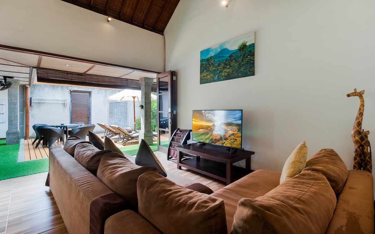 Living room with TV and sofa of villa