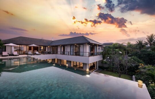 View of Villa Yamuna's swimming pool with Uluwatu vistas and villa exterior shots