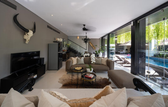 Villa living area with view to pool