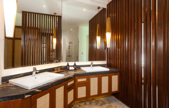 Ensuite bathroom of villa with twin vanities