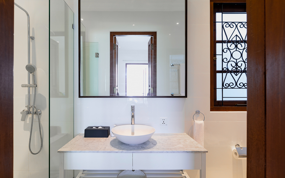 En suite bathroom with basin and shower