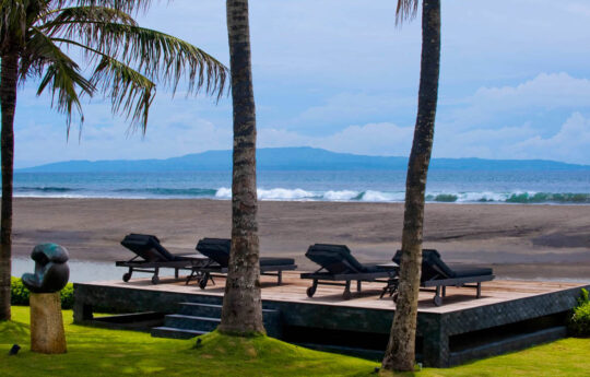 Beach views from villa with deck area with day beds